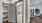 a white kitchen with a white refrigerator