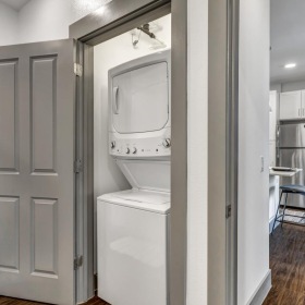 The essence of exceptional living a white kitchen with a white refrigerator